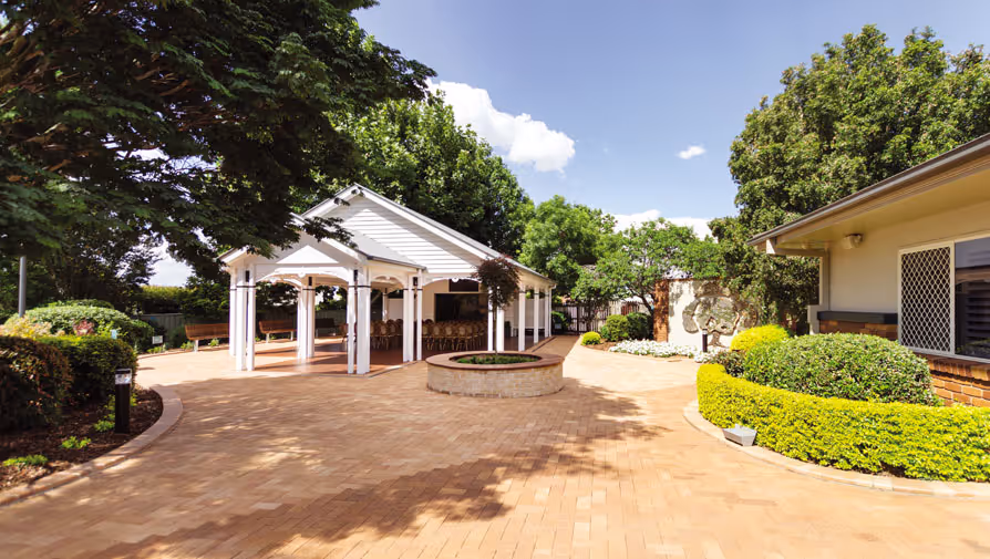 Outdoor gazebo and garden at a funeral home.